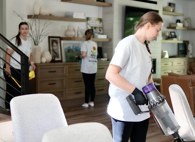 EDGE Cleaning team vacuuming and caring for a local home