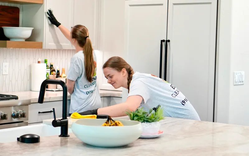 EDGE Cleaning team working together in a residential kitchen